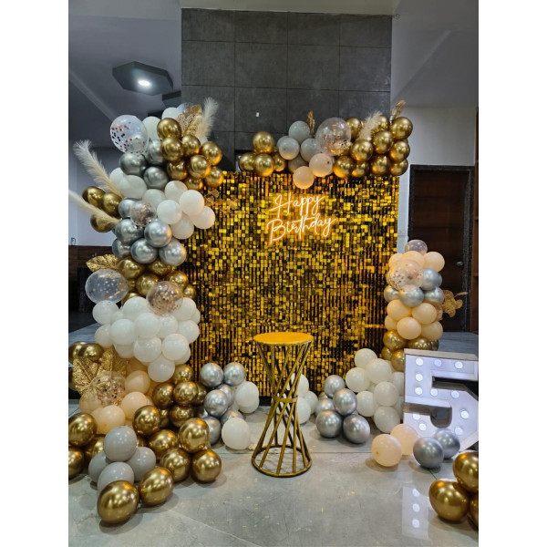 Gold panels birthday decor 